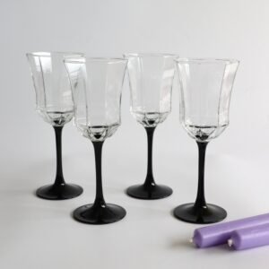 Set van vier Luminarc Octime wijnglazen met helder glas en zwarte voet, elegant en modern design.